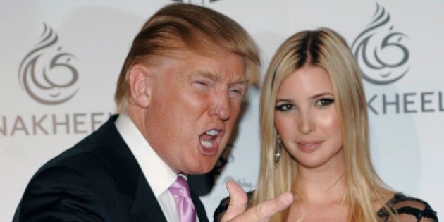 Donald Trump poses with his daughter Ivanka Trump at a party thrown by Nakheel and the Trump Organization to introduce The Trump International Hotel & Tower Dubai, Saturday, Aug. 23, 2008, in Los Angeles. (AP Photo/Chris Pizzello)