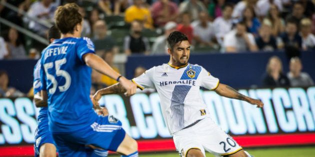 CARSON, CA - SEPTEMBER 12: A.J. DeLaGarza #20 of Los Angeles Galaxy takes a shot on goal during Los Angeles Galaxy's MLS match against Montreal Impact at the StubHub Center on September 12, 2015 in Carson, California. The match ended in 0-0 tie (Photo by Shaun Clark/Getty Images)
