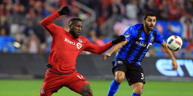 TORONTO, ON - NOVEMBER 30: Jozy Altidore #17 of Toronto FC battles for the ball with Hernn Bernardello #30 of Montreal Impact during the first half of the MLS Eastern Conference Final, Leg 2 game at BMO Field on November 30, 2016 in Toronto, Ontario, Canada. (Photo by Vaughn Ridley/Getty Images)