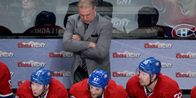 Jan 25, 2014; Montreal, Quebec, CAN; Montreal Canadiens head coach Michel Therrien behind Brendan Gallagher (11) and Max Pacioretty (67) and Travis Moen (32) react during the third period against the Washington Capitals at the Bell Centre. Mandatory Credit: Eric Bolte-USA TODAY Sports