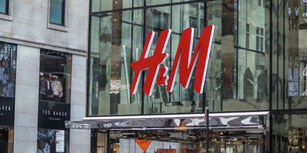 Pedestrians walk outside a Hennes & Mauritz AB (H&M) store in New York, U.S., on Friday, Jan. 15, 2016. The New York-based private research group, the Conference Board, is scheduled to release its consumer confidence sentiment index on January 26. Photographer: Chris Goodney/Bloomberg via Getty Images