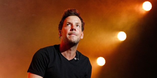 VANCOUVER, BC - AUGUST 25: Singer Pierre Bouvier of French-Canadian pop punk band Simple Plan performs onstage during PNE Summer Night Concert Series at PNE Amphitheatre on August 25, 2016 in Vancouver, Canada. (Photo by Andrew Chin/Getty Images)