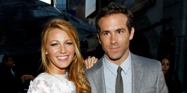 FILE - This June 15, 2011 file photo shows actors Blake Lively, left, and Ryan Reynolds at the premiere of