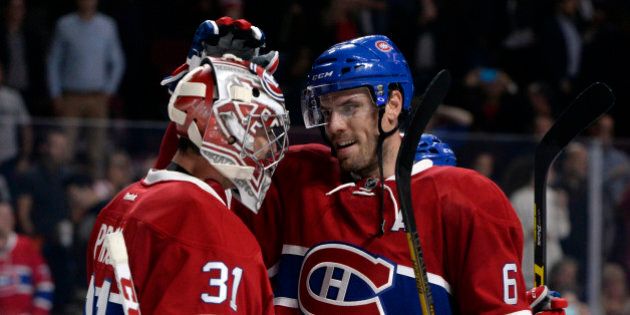 Oct 6, 2016; Montreal, Quebec, CAN; Montreal Canadiens goalie Carey Price (31) and teammate Shea Weber (6) react after defeating the Toronto Maple Leafs during a preseason hockey game at the Bell Centre. Mandatory Credit: Eric Bolte-USA TODAY Sports
