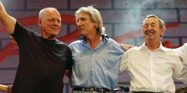 LONDON - JULY 2: (EMBARGOED FOR PUBLICATION IN UK TABLOID NEWSPAPERS UNTIL 48 HOURS AFTER CREATE DATE AND TIME) (L to R) Musicians David Gilmour, Roger Waters, Nick Mason and Richard Wright of Pink Floyd stand on stage at 'Live 8 London' in Hyde Park on July 2, 2005 in London, England. The free concert is one of ten simultaneous international gigs including Philadelphia, Berlin, Rome, Paris, Barrie, Tokyo, Cornwall, Moscow and Johannesburg. The concerts precede the G8 summit (July 6-8) to raising awareness for MAKEpovertyHISTORY. (Photo by Dave Benett/Getty Images)