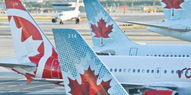 A view of Air Canada planes at Toronto Pearson International Airport. On Wednesday, 20 July 2016, in Toronto, Canada. (Photo by Artur Widak/NurPhoto via Getty Images)