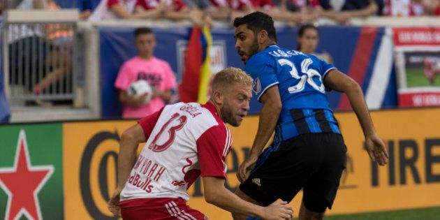 RED BULL ARENA, HARRISON, NEW JERSEY, UNITED STATES - 2016/08/13: Victor Cabrera (36) of Montreal Impact & Mike Grella (13) of New York Red Bulls fight for ball during MLS game between New York Red Bulls & Montreal Impact NYRB won 3 - 1. (Photo by Lev Radin/Pacific Press/LightRocket via Getty Images)