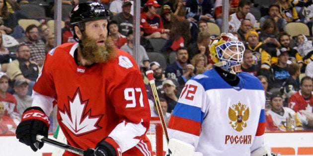 Team Canada's Joe Thornton (97) skates in front of Team Russia goalie Sergei Bobrovsky (72) during the second period of a World Cup of Hockey 2016 exhibition game in Pittsburgh Wednesday, Sept. 14, 2016. Canada won in overtime 3-2. (AP Photo/Gene J. Puskar)