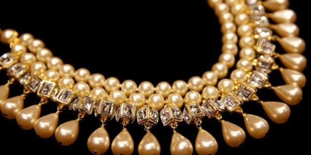 A picture taken on September 13, 2016, shows a 1980s Chanel vintage necklace, part of a private collection, displayed ahead of the Hotel Drouot's auction in Paris on October 10, 2016. / AFP / THOMAS SAMSON (Photo credit should read THOMAS SAMSON/AFP/Getty Images)
