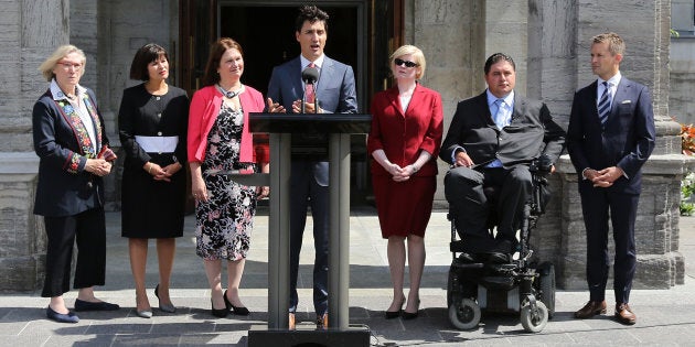 Canadian Prime Minister Justin Trudeau speaks to the press outside Rideau Hall after announcing changes to his cabinet in Ottawa on Aug. 28, 2017.