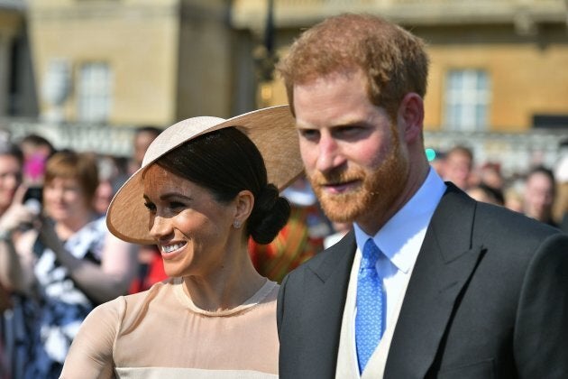 Le duc et la duchesse de Sussex lors du garden party pour le 70e anniversaire du prince de Galles au palais de Buckingham.