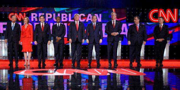 Republican presidential candidates, from left, John Kasich, Carly Fiorina, Marco Rubio, Ben Carson, Donald Trump, Ted Cruz, Jeb Bush, Chris Christie, and Rand Paul take the stage during the CNN Republican presidential debate at the Venetian Hotel & Casino on Tuesday, Dec. 15, 2015, in Las Vegas. (AP Photo/Mark J. Terrill)
