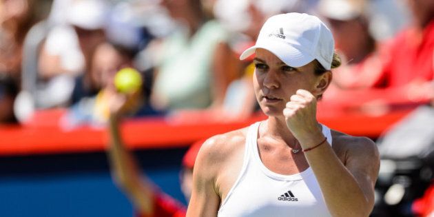 MONTREAL, ON - JULY 31: Simona Halep of Romania reacts against Madison Keys of the United States during day seven in final round action of the Rogers Cup at Uniprix Stadium on July 31, 2016 in Montreal, Quebec, Canada. (Photo by Minas Panagiotakis/Getty Images)