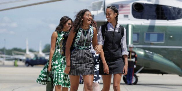 Sasha (L) and Malia Obama, the daughters of U.S. President Barack Obama and U.S. First Lady Michelle Obama walk to Air Force One at Joint Base Andrews, Maryland, U.S., June 17, 2016. REUTERS/Joshua Roberts TPX IMAGES OF THE DAY