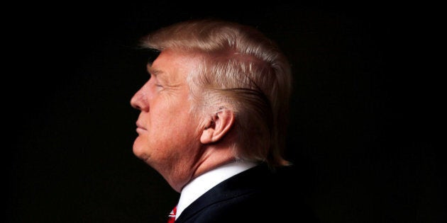 Republican U.S. presidential candidate Donald Trump poses for a photo after an interview with Reuters in his office in Trump Tower, in the Manhattan borough of New York City, U.S., May 17, 2016. REUTERS/Lucas Jackson/File Photo FROM THE FILES PACKAGE