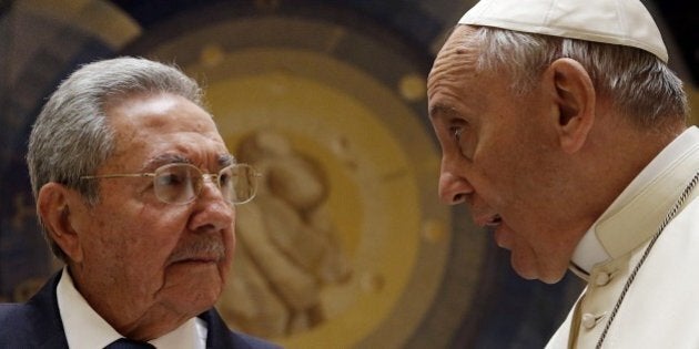 Pope Francis (R) talks with Cuban President Raul Castro during a private audience at the Vatican on May 10, 2015. Cuban President Raul Castro arrived at the Vatican on Sunday to thank Pope Francis for his role in brokering the rapprochement between Havana and Washington. The first South American pope played a key role in secret negotiations between the United States and Cuba that led to the surprise announcement in December that they would seek to restore diplomatic ties after more than 50 years of tensions. AFP PHOTO/POOL/GREGORIO BORGIA (Photo credit should read GREGORIO BORGIA/AFP/Getty Images)