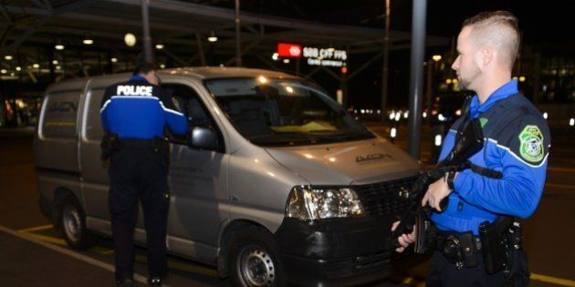 Security forces stop a van at the check vehicles arriving at Geneva's airoport on December 10, 2015, after police raised the alert level and searched the city for several suspected jihadists believed to have links to the Islamic State (IS) group, security sources said. Security services in the Canton of Geneva said they received information on December 9 from Swiss federal authorities about suspicious individuals in the Geneva area. The Tribune de Geneve, in an unconfirmed report, said the intelligence originally came from the United States. / AFP / Richard Juilliart (Photo credit should read RICHARD JUILLIART/AFP/Getty Images)