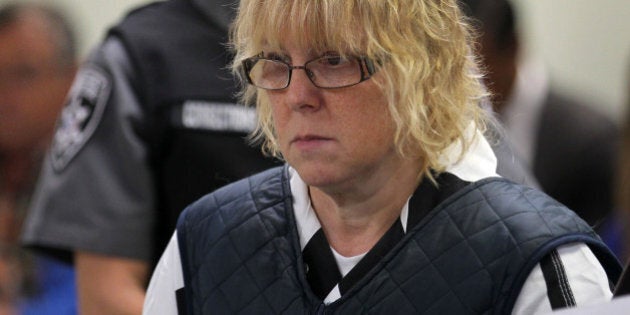 PLATTSBURGH, NY - JUNE 15: Joyce Mitchell (L) appears before Judge Buck Rogers in Plattsburgh City Court on June 15, 2015 in Plattsburgh, New York. Mitchell allegedly aided inmates Richard Matt and David Sweat in their escape from Clinton Correctional Facility. They were discovered missing the morning of June 6. (Photo by G.N. Miller - Pool/Getty Images)