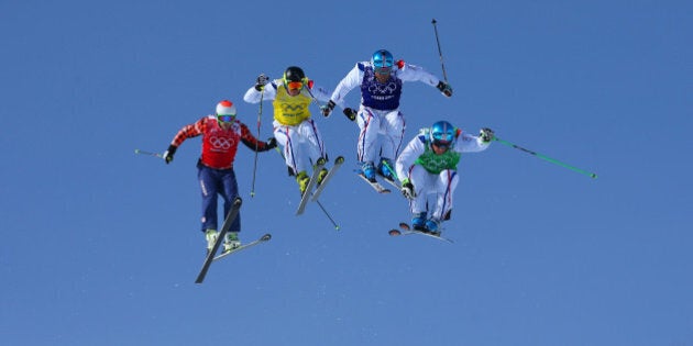 SOCHI, RUSSIA - FEBRUARY 20: (R-L) JF Chapuis, Arnaud Bovolenta, Jonathan Midol of France and Brady Leman of Canada make a jump in the final during the Mens Ski Cross Freestyle Skiing at Rosa Khutor Extreme Park on February 20, 2014 in Sochi, Russia. (Photo by Julian Finney/Getty Images)