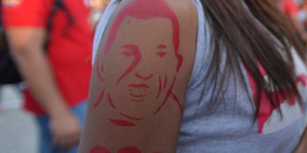 CARACAS, VENEZUELA - MARCH 07: View of a tattoo of a supporter of Chavez in front of the chapel where the body of the dead president remains on March 7, 2013 in Caracas, Venezuela. (Photo by Gregorio Marrero/LatinContent/Getty Images)