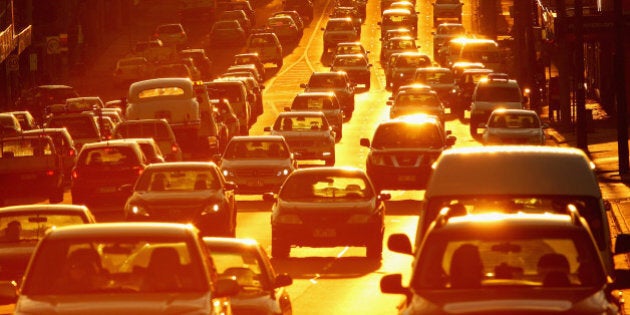 MELBOURNE, AUSTRALIA - MAY 13: Rush hour traffic on a congested road as the sun sets on May 13, 2014 in Melbourne, Australia. Tony Abbott's Coalition government will deliver it's first federal budget tonight and is expected to reveal several welfare spending cuts and tax increases as well as increases in defence and infrastructure spending. (Photo by Scott Barbour/Getty Images)