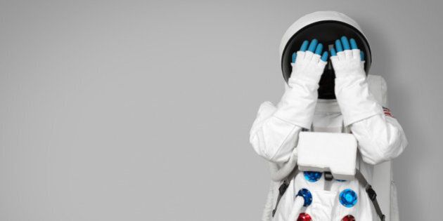 Astronaut hides his face
