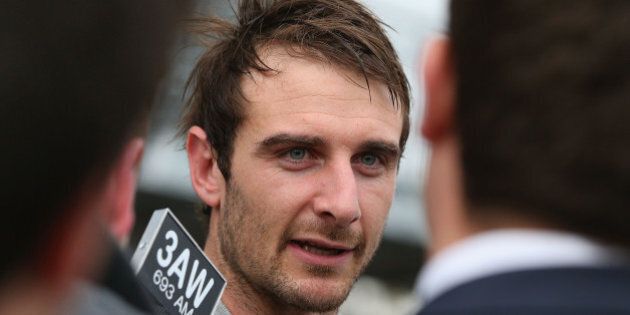 MELBOURNE, AUSTRALIA - AUGUST 18: Bombers player Jobe Watson speaks to the media after James Hird announced his resignation as head coach of the Essendon Bombers AFL Football Club at True Vaule Solar Centre on August 18, 2015 in Melbourne, Australia. (Photo by Michael Dodge/Getty Images)