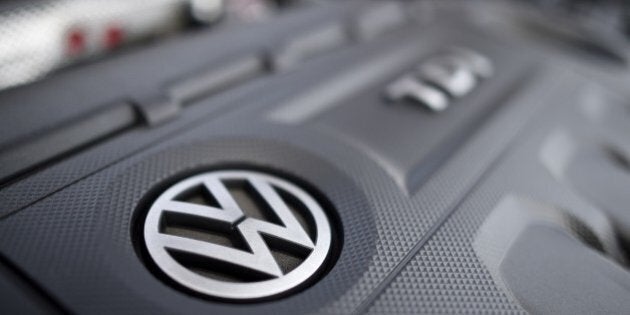 This picture taken on October 15, 2015 in Cardiff shows a Volkswagen logo on the engine of a diesel car. The German authorities tightened the screws on Volkswagen today, saying they would order it to recall 2.4 million vehicles across the country that are fitted with pollution-cheating software. AFP PHOTO / DAMIEN MEYER (Photo credit should read DAMIEN MEYER/AFP/Getty Images)