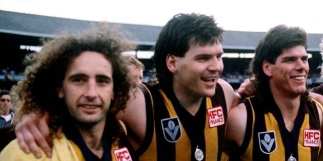 1986: John Platten, Jason Dunstall, Gary Ayres, Dermott Brereton and John Kennedy of Hawthorn celebrate their win, in the VFL Grand Final match between Hawthorn and Carlton, played at the Melbourne Cricket Ground, Melbourne, Australia. Mandatory Credit:Tony Feder/ALLSPORT