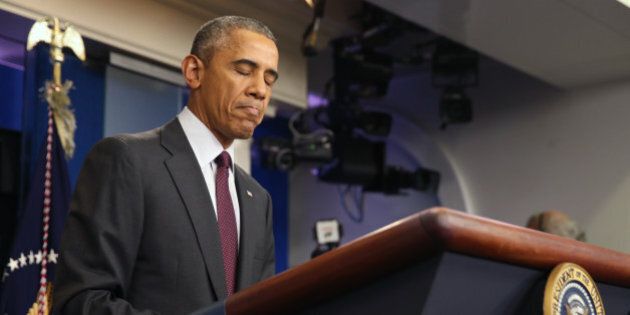 President Barack Obama pauses as he speaks in the Brady Press Briefing Room at the White House in Washington, Thursday, Oct. 1, 2015, about the shooting at the community college in Oregon. The shooting happened at Umpqua Community College in Roseburg, Ore., about 180 miles south of Portland. (AP Photo/Andrew Harnik)
