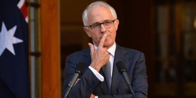 New Australian Prime Minister Malcolm Turnbull ponders a question after announcing his new cabinet at a press conference in Canberra on September 20, 2015. Turnbull announced the cabinet reshuffle, promoting more women to key positions just days after he ousted Tony Abbott in a party coup. AFP PHOTO / Peter PARKS (Photo credit should read PETER PARKS/AFP/Getty Images)