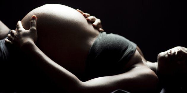USA, Utah, Orem, Studio shot of pregnant woman