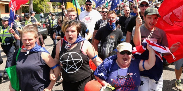 BENDIGO, AUSTRALIA - OCTOBER 10: Protestors march through the streets of Bendigo on October 10, 2015 in Bendigo, Australia. Protesters gathered showing their discontent with current issues including the building of a mosque in Bendigo, immigration policies and multiculturalism. (Photo by Quinn Rooney/Getty Images)