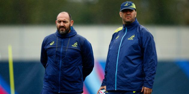 LONDON, ENGLAND - OCTOBER 05: Michael Cheika, Head Coach of Australia (r) and Mario Ledesma, Scrum Coach of Australia look on during a training session at Dulwich College on October 5, 2015 in London, United Kingdom. (Photo by Dan Mullan/Getty Images)