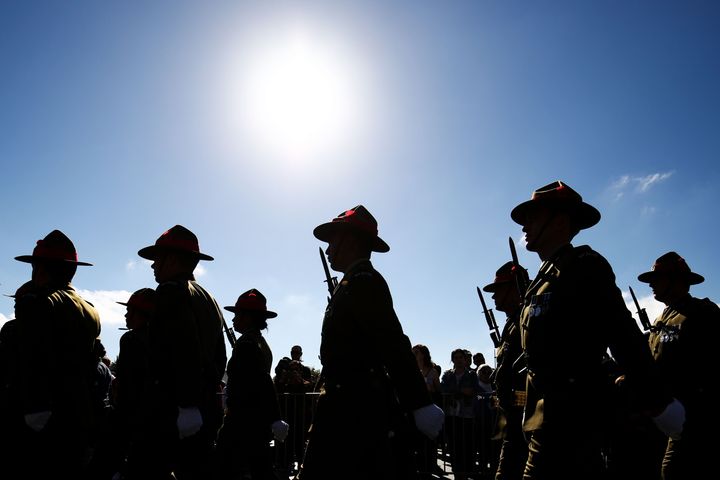 Soldiers march during the Anzac Day National Commemoration Service.