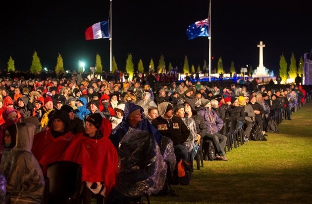 Australian family members wait for the dawn ceremony to start.