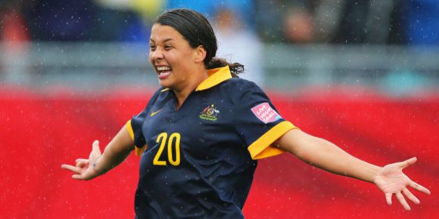MONCTON, NB - JUNE 21: Samantha Kerr of Australia celebrates victory after the FIFA Women's World Cup 2015 round of 16 match between Brazil and Australia at Moncton Stadium on June 21, 2015 in Moncton, Canada. Australia reach the quarter finals with a 1-0 win. (Photo by Elsa/Getty Images)