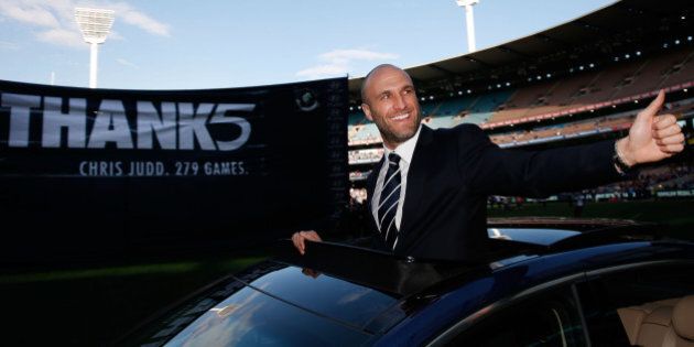 MELBOURNE, AUSTRALIA - AUGUST 23: Chris Judd of the Blues completes a lap of honour during the 2015 AFL round 21 match between the Carlton Blues and the Melbourne Demons at the Melbourne Cricket Ground, Melbourne, Australia on August 23, 2015. (Photo by Michael Willson/AFL Media/Getty Images)