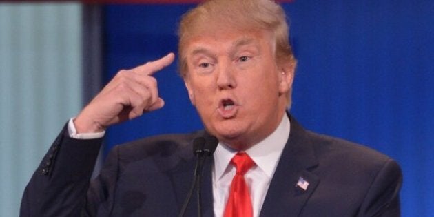 Real estate tycoon Donald Trump participates in the Republican presidential primary debate on August 6, 2015 at the Quicken Loans Arena in Cleveland, Ohio. AFP PHOTO / MANDEL NGAN (Photo credit should read MANDEL NGAN/AFP/Getty Images)