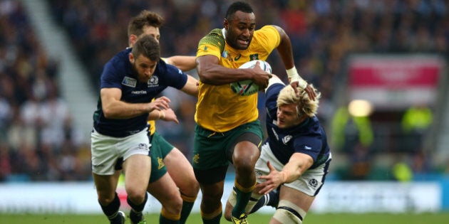 LONDON, ENGLAND - OCTOBER 18: Tevita Kuridrani of Australia breaks past Richie Gray (R) of Scotland during the 2015 Rugby World Cup Quarter Final match between Australia and Scotland at Twickenham Stadium on October 18, 2015 in London, United Kingdom. (Photo by Dan Mullan/Getty Images)