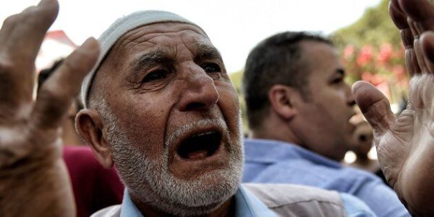 A Turkish man reacts during the July 18 funeral of police officer Erol Ince, killed in Friday's thwarted coup attempt, in Istanbul. 