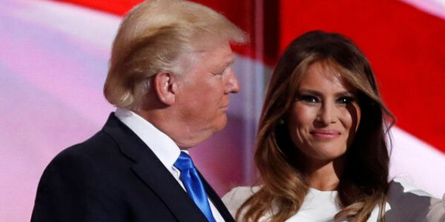 Melania Trump stands with her husband Republican U.S. presidential candidate Donald Trump at the Republican National Convention in Cleveland, Ohio, U.S. July 18, 2016. REUTERS/Mark Kauzlarich