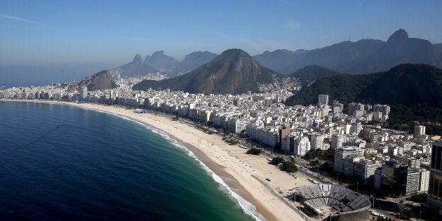 RIO DE JANEIRO, BRAZIL - JULY 04: Work continues at the Beach Volleyball Arena on Copacabana Beach in preparation for the 2016 Olympic Games on July 4, 2016 in Rio de Janeiro, Brazil. (Photo by Matthew Stockman/Getty Images)