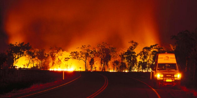 Bush fire at Arnhem Highway at night, Kakadu National Park, Northern Territory, Australia