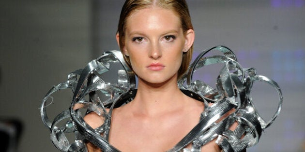 MIAMI BEACH, FL - JULY 14: A model walks the runway at Rocky Gathercole Runway Show during Art Hearts Fashion Miami Swim Week Presented by AIDS Healthcare Foundation at Collins Park on July 14, 2016 in Miami Beach, Florida. (Photo by Arun Nevader/Getty Images for Art Hearts Fashion)