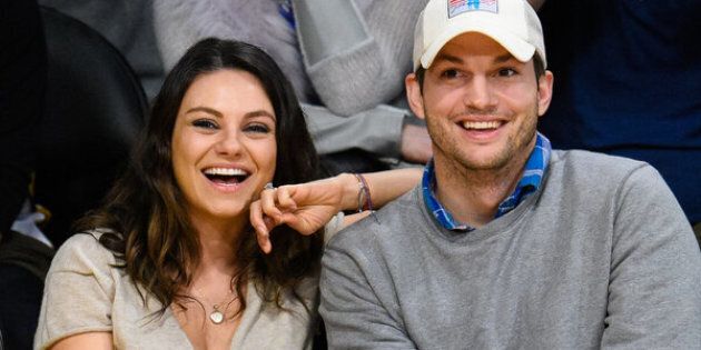 LOS ANGELES, CA - DECEMBER 19: Mila Kunis (L) and Ashton Kutcher attend a basketball game between the Oklahoma City Thunder and the Los Angeles Lakers at Staples Center on December 19, 2014 in Los Angeles, California. (Photo by Noel Vasquez/GC Images)