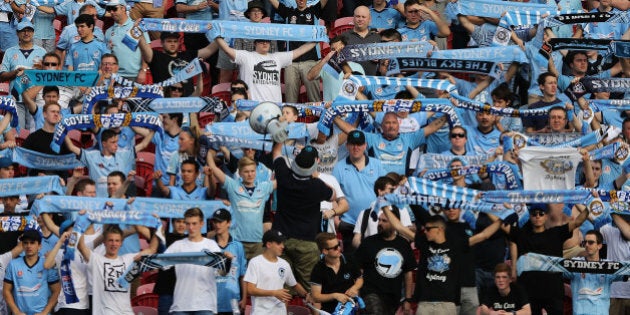 NEWCASTLE, AUSTRALIA - OCTOBER 17: Sydney FC fans show their support during the round two A-League match between the Newcastle Jets and Sydney FC at Hunter Stadium on October 17, 2015 in Newcastle, Australia. (Photo by Ashley Feder/Getty Images)