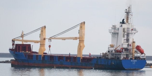 The BBC Shanghai cargo ship leaves the habour on October 15, 2015 in Cherbourg-Octeville. The vessel, whose security has been questioned, delivers nuclear waste back to Australia after its reprocessing in France. AFP PHOTO / CHARLY TRIBALLEAU (Photo credit should read CHARLY TRIBALLEAU/AFP/Getty Images)