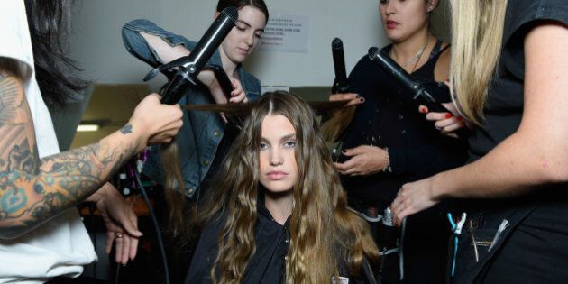 MILAN, ITALY - SEPTEMBER 27: A model is seen backstage ahead of the Trussardi show during Milan Fashion Week Spring/Summer 2016 on September 27, 2015 in Milan, Italy. (Photo by Selin Alemdar/Getty Images)