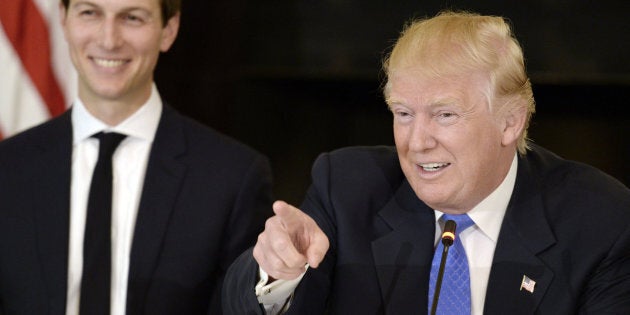 U.S. President Donald Trump speaks while Jared Kushner, senior White House advisor, stands by on Feb. 23.